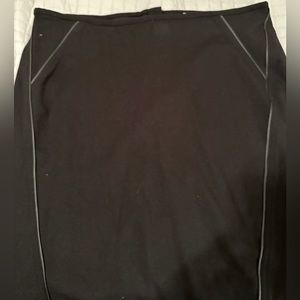 CHICOS black skirt with faux leather edging. So slimming design